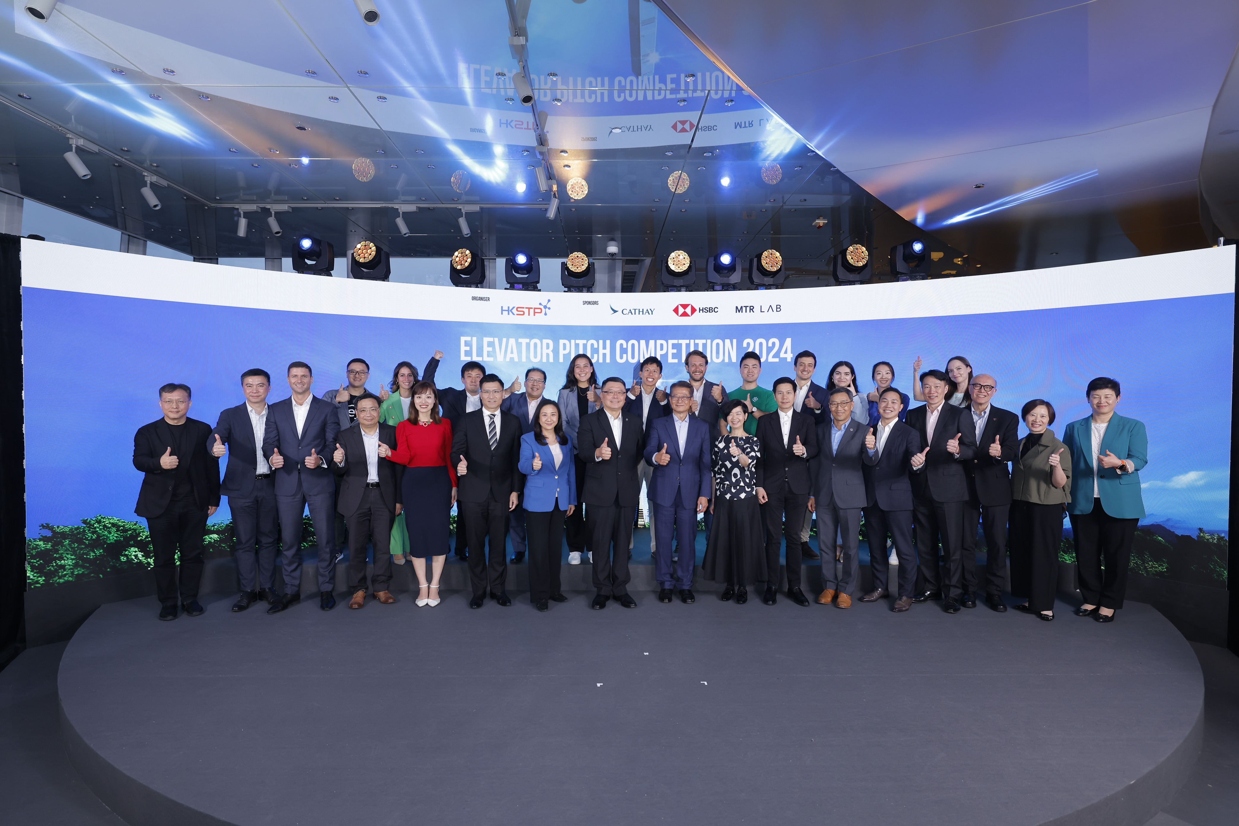 Paul Chan, Financial Secretary of Hong Kong SAR (9th from right), Dr Sunny Chai, Chairman at HKSTP (8th from left), the top 12 finalists together with the competition’s panel of judges and distinguished guests.